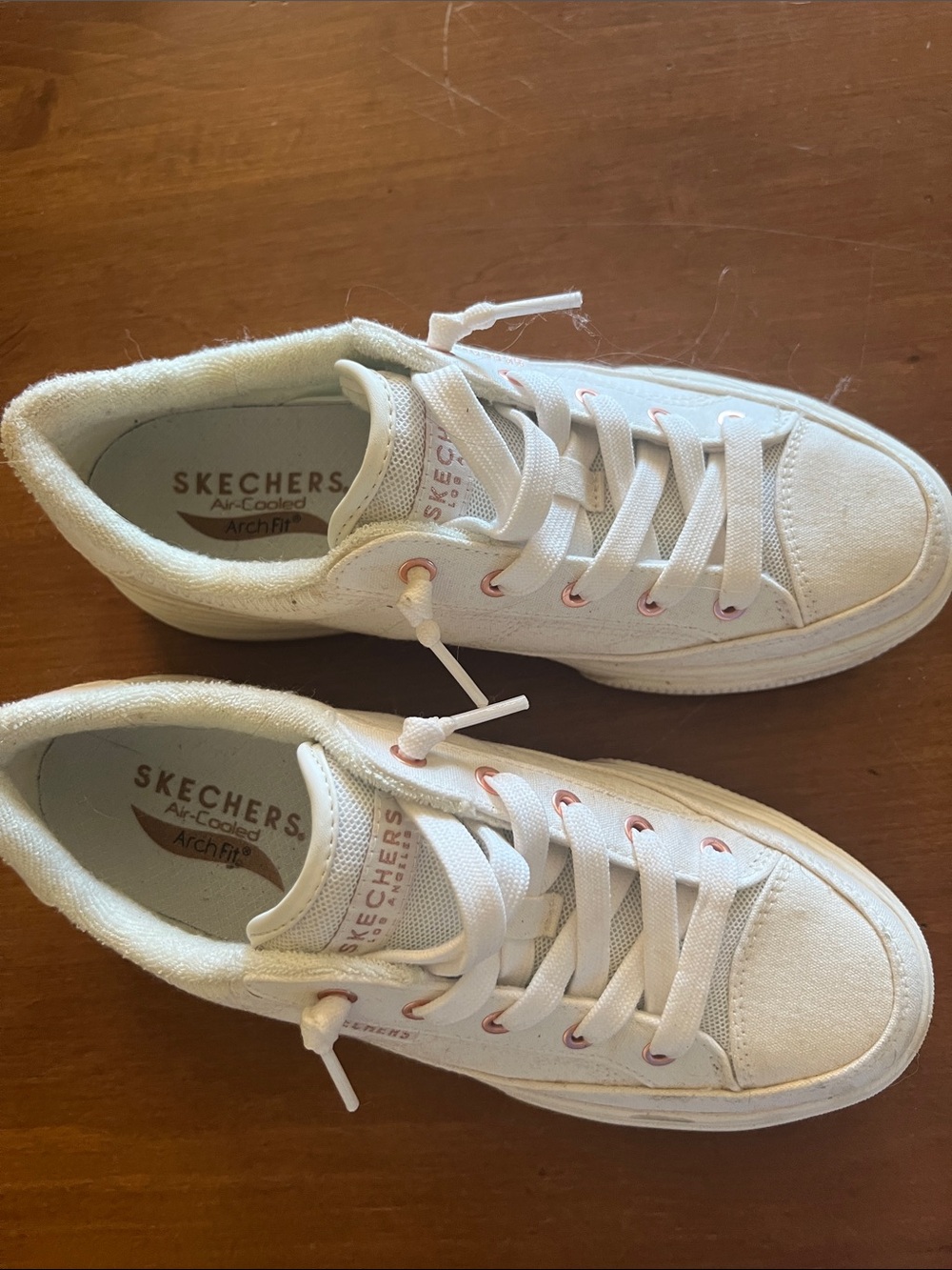 Skechers White Canvas Sneakers with Pink Eyelets